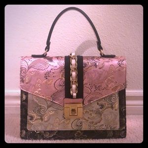 A fancy Aldo purse- used but very good condition